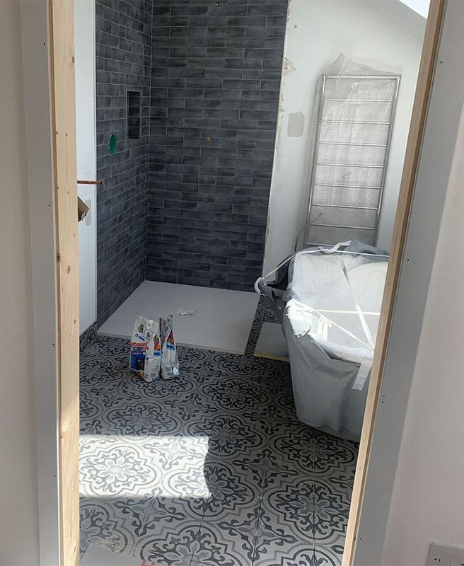 Shower and floor tiling in Greenhithe
